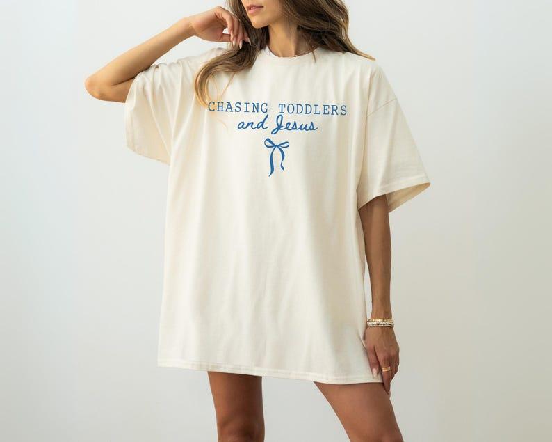 The "Chasing Toddlers & Jesus" Everyday Tee -  Christian Mom Shirt with Coquette Bow Detail